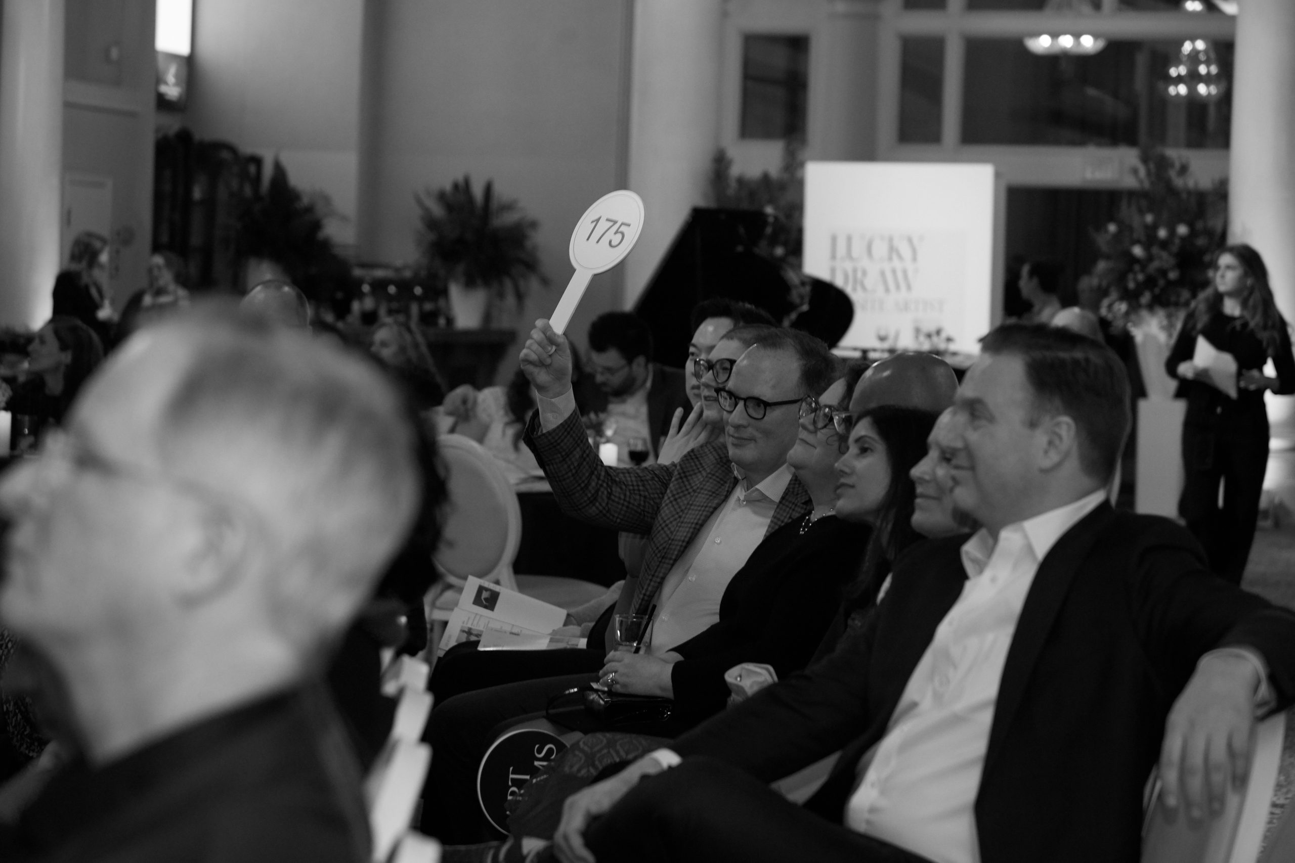 Group of young adults having fun at event